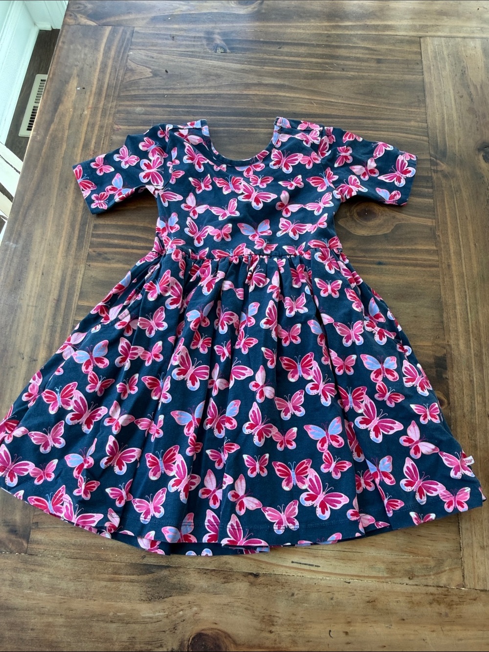 Ruffle Butts Navy Dress with Pink Butterfly Print